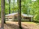 View of the home's garage and additional side entrance at 50 Ridgeview Dr, Jonesboro, GA 30236