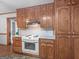 Updated kitchen with white appliances and mosaic backsplash at 50 Ridgeview Dr, Jonesboro, GA 30236