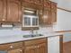 Kitchen with updated countertops and wooden cabinetry at 50 Ridgeview Dr, Jonesboro, GA 30236