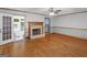 Spacious living room features hardwood floors and a stone fireplace at 50 Ridgeview Dr, Jonesboro, GA 30236