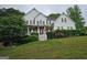Charming two-story home with a beautifully landscaped front yard, perfect for curb appeal at 22 Shea Ct, Douglasville, GA 30134