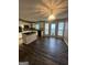 Bright kitchen with modern appliances, island, and access to the back deck offers a practical and stylish cooking space at 22 Shea Ct, Douglasville, GA 30134