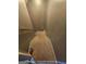 Carpeted staircase featuring neutral colored walls and a wooden railing at 22 Shea Ct, Douglasville, GA 30134