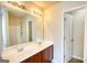 Bathroom featuring a double vanity with plenty of space and a shower at 11224 Aliyah Dr, Hampton, GA 30228