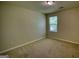 Bedroom featuring carpet flooring and a window for plenty of light at 11224 Aliyah Dr, Hampton, GA 30228