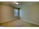 Bedroom with carpet and a window with a view of mature trees at 11224 Aliyah Dr, Hampton, GA 30228