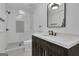 Bathroom featuring a walk-in shower, vanity with sink, and modern fixtures at 105 Suffolk Pl, Fayetteville, GA 30215