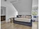 Cozy bedroom with a daybed, window seat, hardwood floors and ensuite bathroom at 105 Suffolk Pl, Fayetteville, GA 30215