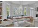 Dining area with bench seating, chandelier and lots of natural light at 105 Suffolk Pl, Fayetteville, GA 30215