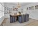 Elegant dining room with custom cabinetry, stylish decor, and ample natural light at 105 Suffolk Pl, Fayetteville, GA 30215