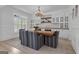 Charming dining area featuring custom built-ins and a decorative chandelier at 105 Suffolk Pl, Fayetteville, GA 30215