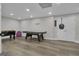 Spacious game room with an air hockey table and a foosball table at 105 Suffolk Pl, Fayetteville, GA 30215