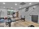 Spacious home gym featuring hardwood floors and an array of exercise equipment at 105 Suffolk Pl, Fayetteville, GA 30215