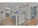Gourmet kitchen with white cabinets, marble countertops, and stainless steel appliances at 105 Suffolk Pl, Fayetteville, GA 30215