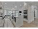 Gourmet kitchen with white cabinets, marble countertops, and stainless steel appliances at 105 Suffolk Pl, Fayetteville, GA 30215