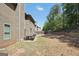 Spacious backyard with a table, perfect for outdoor entertaining and relaxation at 9929 Musket Ridge Cir, Jonesboro, GA 30238