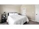 Comfortable bedroom with natural light and a simple, cozy design at 9929 Musket Ridge Cir, Jonesboro, GA 30238