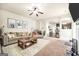 Spacious living room features comfortable seating, an open layout, and stylish decor at 9929 Musket Ridge Cir, Jonesboro, GA 30238