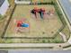 Spacious backyard with a fenced playground at 9929 Musket Ridge Cir, Jonesboro, GA 30238