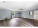 Bonus room features hardwood floors and a window with drapes at 389 Rosser Rd, Mcdonough, GA 30252