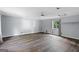 Bonus room with wood paneling and window at 389 Rosser Rd, Mcdonough, GA 30252