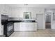 Well-lit kitchen featuring functional appliances and ample counter space at 389 Rosser Rd, Mcdonough, GA 30252