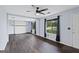 Inviting living room with brick fireplace and windows allowing natural light at 389 Rosser Rd, Mcdonough, GA 30252