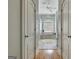 Elegant bathroom with a soaking tub, glass block, and natural light at 135 Adams Park Dr, Fayetteville, GA 30214