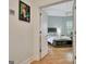 View of the primary bedroom with hardwood floors and a ceiling fan at 135 Adams Park Dr, Fayetteville, GA 30214