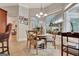 Bright dining area with views of the backyard and easy access to the butler's pantry at 135 Adams Park Dr, Fayetteville, GA 30214