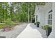 Elegant exterior featuring arched windows, stylish planters, and beautifully landscaped grounds at 135 Adams Park Dr, Fayetteville, GA 30214