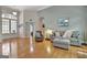 Cozy living room with hardwood floors, comfortable seating, and elegant decor at 135 Adams Park Dr, Fayetteville, GA 30214