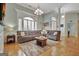 Spacious living room with a sectional sofa, area rug, and recessed lighting at 135 Adams Park Dr, Fayetteville, GA 30214