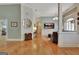 Elegant living room featuring hardwood floors, modern decor, and bright lighting at 135 Adams Park Dr, Fayetteville, GA 30214
