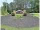View of the Adam's Park community sign surrounded by manicured landscaping at 135 Adams Park Dr, Fayetteville, GA 30214