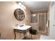 Unique bathroom with copper walls, walk-in shower and custom designed sink at 204 Clear Springs Ln, Peachtree City, GA 30269