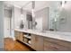 Spacious bathroom featuring double vanities, marble countertops, and a large mirror at 204 Clear Springs Ln, Peachtree City, GA 30269