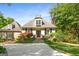 Charming home featuring stone accents, dormer window, meticulously landscaped front yard and inviting walkway at 204 Clear Springs Ln, Peachtree City, GA 30269