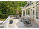 Beautiful outdoor deck with patio furniture and serene backyard views at 204 Clear Springs Ln, Peachtree City, GA 30269