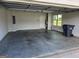 Empty two car garage with a window at 495 Mcgiboney Ln, Covington, GA 30016