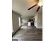Open kitchen with stainless steel appliances and an island at 495 Mcgiboney Ln, Covington, GA 30016