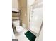 Cozy bathroom featuring a stand up shower with glass doors, toilet, and towel rack with towels at 110 Cedar Creek Ct, Fayetteville, GA 30215
