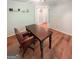 Cozy office space with a dark wood desk and a comfortable leather chair at 110 Cedar Creek Ct, Fayetteville, GA 30215