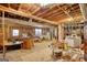 Unfinished basement with exposed wood beams, ductwork and visible framing awaiting customization at 3341 Deer Hollow Sw Trl, Conyers, GA 30094