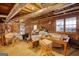 Spacious unfinished basement with exposed ductwork, wooden beams and multiple windows for natural light at 3341 Deer Hollow Sw Trl, Conyers, GA 30094