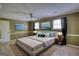 Staged bedroom featuring modern decor, and neutral tones for a calming feel at 3341 Deer Hollow Sw Trl, Conyers, GA 30094