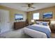 Serene bedroom with a blue duvet, a ceiling fan and a modern dresser at 3341 Deer Hollow Sw Trl, Conyers, GA 30094