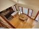 View of dining area from upper hallway featuring wood table with chairs and counter with stools at 3341 Deer Hollow Sw Trl, Conyers, GA 30094