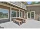 Back deck featuring table and chairs and backyard access through sliding door at 780 Birkdale Dr, Fayetteville, GA 30215