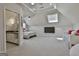 The upper level bonus room has a bathroom ensuite, and a sleeping area, with lots of natural light and space at 780 Birkdale Dr, Fayetteville, GA 30215